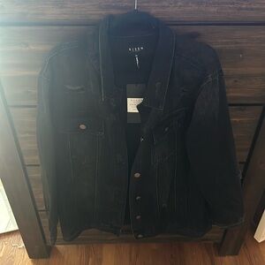 Black distressed Jean jacked by Risen